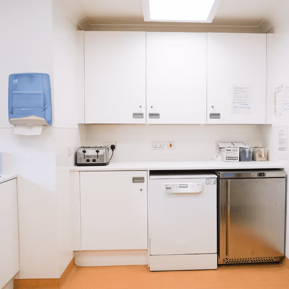 Medical building refurbishment team ensuring safety compliance during hospital upgrades.