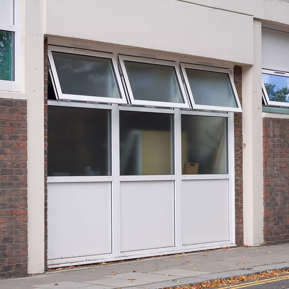 Close-up of the sealed frame highlighting the mastic finish around a newly installed window.