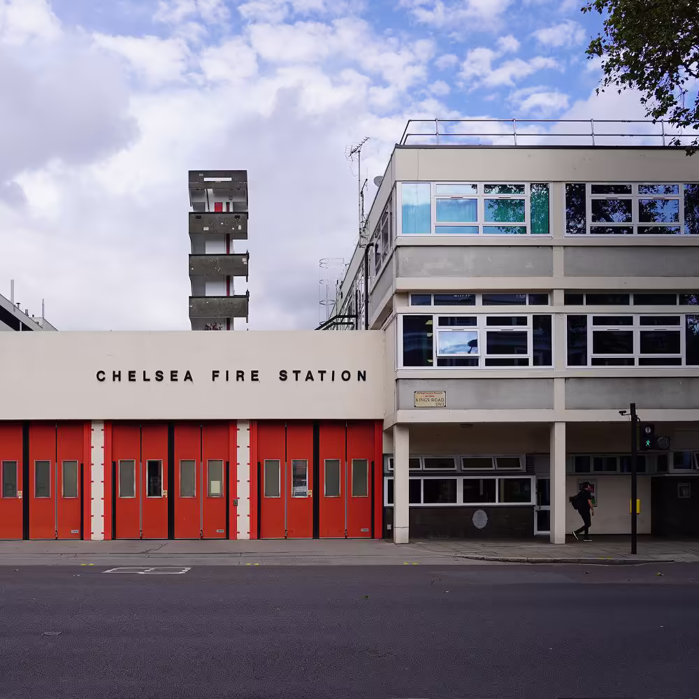 Exterior frontage displaying rows of upgraded windows with scaffold struck from site.